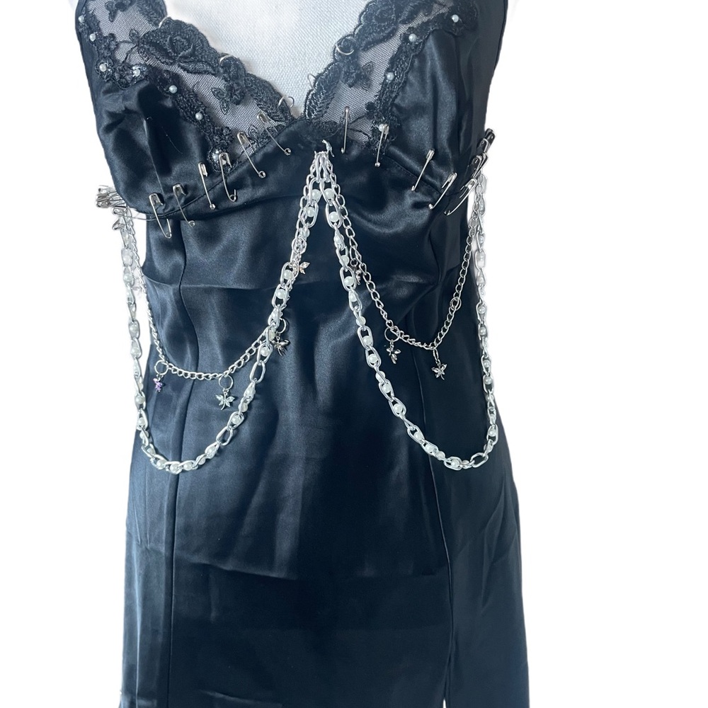 This is a reworked Victoria’s Secret slip dress in the size Xs